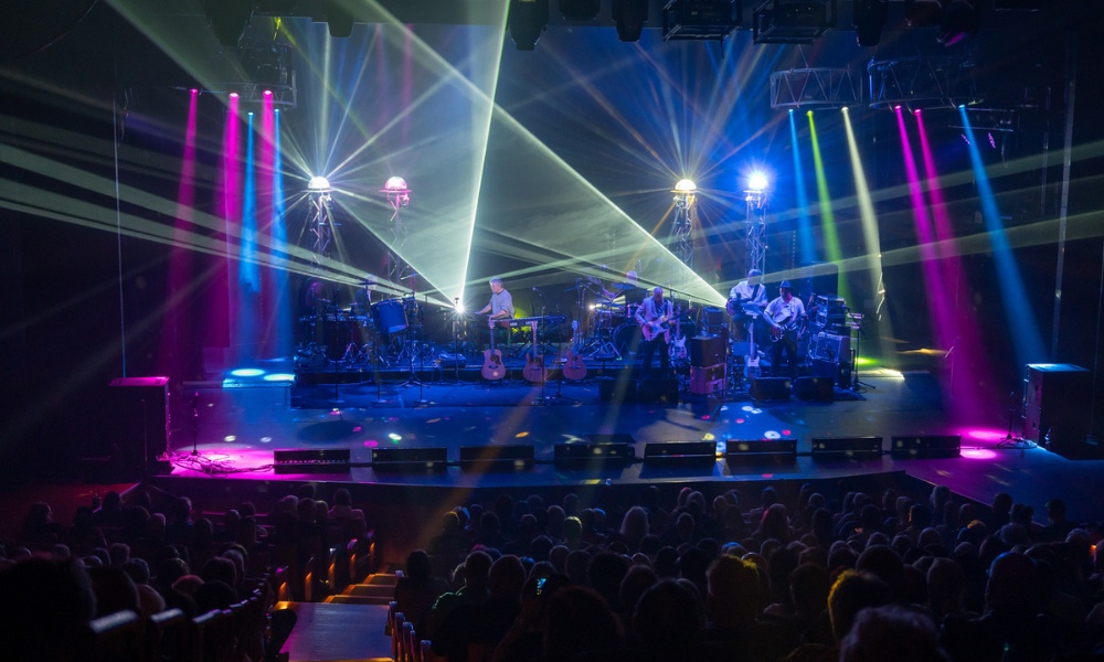 Full-size stage and lights in use at Addison Theatre.